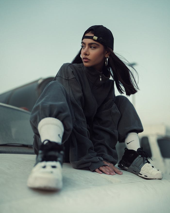 services-04 Stylish young woman posing in urban streetwear fashion outdoors.